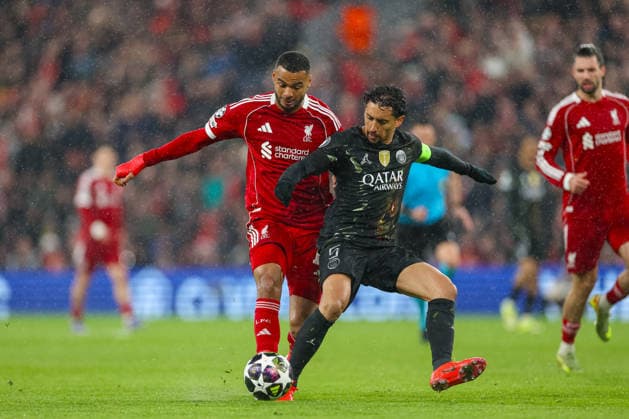 Football - UEFA Champions League - Quarter-Final - 2nd Leg - Liverpool FC v Paris Saint-Germain FC LIVERPOOL, ENGLAND - Tuesday, April 14, 2026: Liverpool s Cody Gakpo is challenged by Paris Saint-Germain s Marcos Aoas CorrÃªa Marquinhos (R) during the UEFA Champions League Quarter-Final 2nd Leg match between Liverpool FC and Paris Saint-Germain FC at Anfield. (Photo by David Rawcliffe Propaganda) LIVERPOOL Anfield MERSEYSIDE ENGLAND  Copyright: xDavidxRawcliffex P2026-04-14-Liverpool_PSG-90