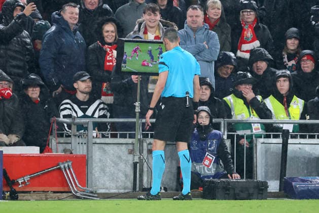 Liverpool FC v Paris Saint-Germain FC - UEFA Champions League 2025 26 Quarter-Final Second Leg Referee Maurizio Mariani watches VAR and overturns his penalty decision during the UEFA Champions League 2025 26 Quarter-Final Second Leg match between Liverpool FC and Paris Saint-Germain FC at Anfield on April 14, 2026 in Liverpool, England. WARNING! This Photograph May Only Be Used For Newspaper And Or Magazine Editorial Purposes. May Not Be Used For Publications Involving 1 player, 1 Club Or 1 Competition Without Written Authorisation From Football DataCo Ltd. For Any Queries, Please Contact Football DataCo Ltd on +44 (0) 207 864 9121 Liverpool Anfield England United Kingdom Copyright: xAllstarxPicturexLibraryxLtdx