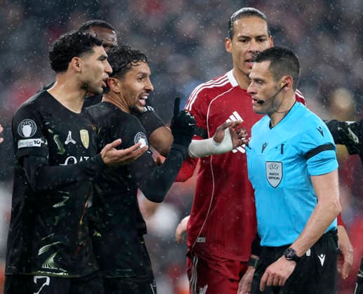 Liverpool FC v Paris Saint-Germain FC - UEFA Champions League 2025 26 Quarter-Final Second Leg Achraf Hakimi, Marquinhos of Paris Saint-Germain, Virgil van Dijk of Liverpool and Referee Maurizio Mariani during the UEFA Champions League 2025 26 Quarter-Final Second Leg match between Liverpool FC and Paris Saint-Germain FC at Anfield on April 14, 2026 in Liverpool, England. WARNING! This Photograph May Only Be Used For Newspaper And Or Magazine Editorial Purposes. May Not Be Used For Publications Involving 1 player, 1 Club Or 1 Competition Without Written Authorisation From Football DataCo Ltd. For Any Queries, Please Contact Football DataCo Ltd on +44 (0) 207 864 9121 Liverpool Anfield England United Kingdom Copyright: xAllstarxPicturexLibraryxLtdx