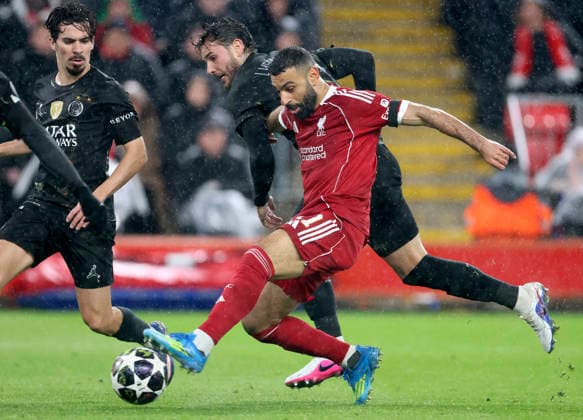 Liverpool FC v Paris Saint-Germain FC - UEFA Champions League 2025 26 Quarter-Final Second Leg Mohamed Salah of Liverpool and Lucas Hernandez of Paris Saint-Germain challenge during the UEFA Champions League 2025 26 Quarter-Final Second Leg match between Liverpool FC and Paris Saint-Germain FC at Anfield on April 14, 2026 in Liverpool, England. WARNING! This Photograph May Only Be Used For Newspaper And Or Magazine Editorial Purposes. May Not Be Used For Publications Involving 1 player, 1 Club Or 1 Competition Without Written Authorisation From Football DataCo Ltd. For Any Queries, Please Contact Football DataCo Ltd on +44 (0) 207 864 9121 Liverpool Anfield England United Kingdom Copyright: xAllstarxPicturexLibraryxLtdx