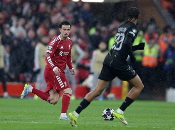 Liverpool, England, 14th April 2026. Curtis Jones of Liverpool in action during the Liverpool vs Paris Saint Germain UEFA Champions League quarter final 2nd leg match at Anfield, Liverpool. Picture credit should read: Jessica Hornby Sportimage EDITORIAL USE ONLY. No use with unauthorised audio, video, data, fixture lists, club league logos or live services. Online in-match use limited to 120 images, no video emulation. No use in betting, games or single club league player publications. SPI_102_JH_Liverpool_PSG SPI-4687-0101