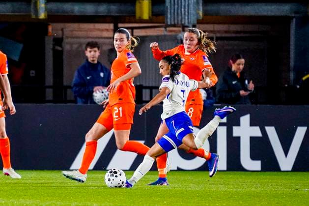 Sakina Karchaoui of France shoots under pressure from Wieke Kaptein of the Netherlands Netherlands v France, FIFA Women s World Cup 2027 Qualifier, Netherlands v France, Rat Verlegh Stadion, April 14, 2026, Breda, Netherlands.