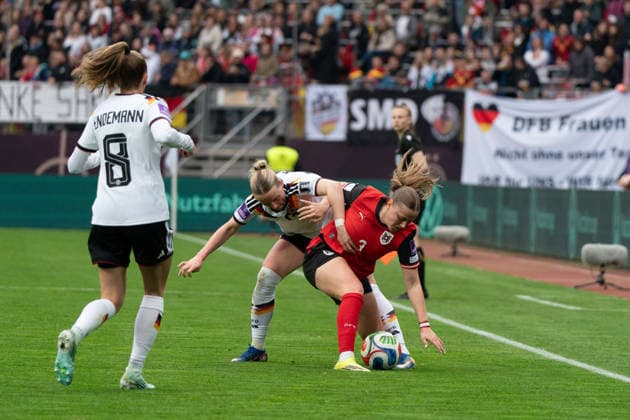 NUREMBERG, GERMANY - APRIL 14: Franziska Kett (17 Germany) and Melanie Brunnthaler (7 Austria) during the FIFA Women s World Cup Qualification match between Germany and Austria at Max-Morlock-Stadion on April 14, 2026 in Nuremberg, Germany. (Photo by Qianru Zhang Press Photo) Copyright: xQianruxZhang SPPx Sportspressphoto_SPR129529