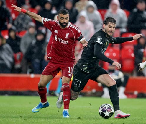 Liverpool FC v Paris Saint-Germain FC - UEFA Champions League 2025 26 Quarter-Final Second Leg Mohamed Salah of Liverpool and Lucas Hernandez of Paris Saint-Germain challenge during the UEFA Champions League 2025 26 Quarter-Final Second Leg match between Liverpool FC and Paris Saint-Germain FC at Anfield on April 14, 2026 in Liverpool, England. WARNING! This Photograph May Only Be Used For Newspaper And Or Magazine Editorial Purposes. May Not Be Used For Publications Involving 1 player, 1 Club Or 1 Competition Without Written Authorisation From Football DataCo Ltd. For Any Queries, Please Contact Football DataCo Ltd on +44 (0) 207 864 9121 Liverpool Anfield England United Kingdom Copyright: xAllstarxPicturexLibraryxLtdx