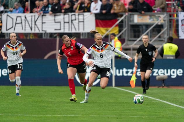 NUREMBERG, GERMANY - APRIL 14: Sarah Gutmann (3 Austria) and Vivien Endemann (8 Germany) during the FIFA Women s World Cup Qualification match between Germany and Austria at Max-Morlock-Stadion on April 14, 2026 in Nuremberg, Germany. (Photo by Qianru Zhang Press Photo) Copyright: xQianruxZhang SPPx Sportspressphoto_SPR129692