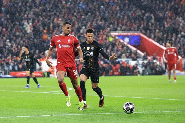 Liverpool, England, 14th April 2026. Ryan Gravenberch of Liverpool is challenged by Desire Doue of Paris Saint-Germain during the Liverpool vs Paris Saint Germain UEFA Champions League quarter final 2nd leg match at Anfield, Liverpool. Picture credit should read: Jessica Hornby Sportimage EDITORIAL USE ONLY. No use with unauthorised audio, video, data, fixture lists, club league logos or live services. Online in-match use limited to 120 images, no video emulation. No use in betting, games or single club league player publications. SPI_118_JH_LIVERPOOL_PSG SPI-4687-0118