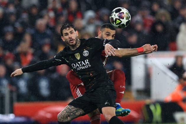 RECORD DATE NOT STATED 14th April 2026; Anfield, Liverpool, Merseyside, England; UEFA Champions League Football, Liverpool versus Paris Saint Germain; Mohammed Salah of Liverpool passes the ball under pressure from Lucas Hernandez of PSG DavidxBlunsden