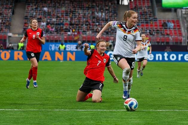 Sjoeke Nuesken 9 Germany in action against Melanie Brunnthaler 7 Austria , Germany vs Austria, DFB, Football, Women, Womens World Cup Qualification, Group stage, Group D, Matchday 3 of 6, Season 2025 26, 14 04 2026 Nuernberg Bayern Germany Copyright: xkolbert-press MartinxAgüerax