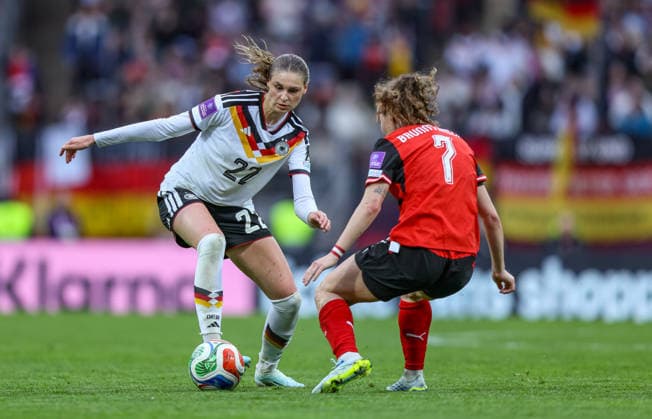 GER, Nuremberg, Germany vs Austria, International match, Football, FIFA, 2026 2027 season, World Cup Qualification, Max Morlock Stadium, 3 Matchday in picture f l Jule Brand Germany Women 22 , Melanie Brunnthaler Austria 7 DFB DFL REGULATIONS PROHIBIT ANY USE OF PHOTOGRAPHS AS IMAGE SEQUENCES AND OR QUASI VIDEO, 14 04 2026 Copyright: HMBxMedia HendrikxHamelau