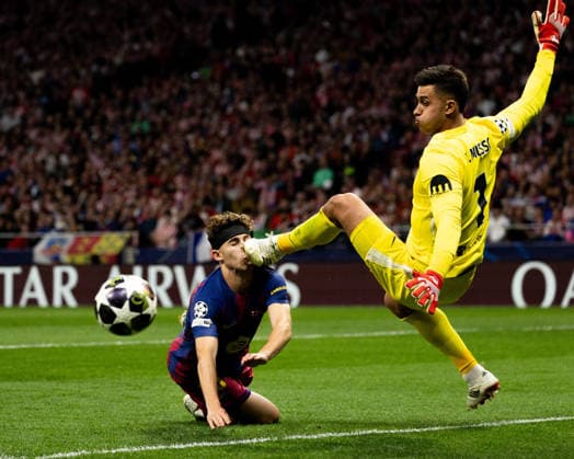 April 14, 2026, Barcelona, Barcelona, Spain: FERMIN LOPEZ (L) of FC Barcelona, Barca challenges for the ball with JUAN MUSSO (R) of Atletico de Madrid during the UEFA Champions League Quarter Final second leg match between Atletico de Madrid and FC Barcelona at Riyadh Air Metropolitano. Barcelona scored 2:1 Atletico De Madrid won 3:2 on agg. Soccer 2026: Champions League: Barcelona 2:1 Atletico De Madrid  - ZUMAs316 20260414_znp_s316_046 Copyright: xMartixSeguraxRamonedax