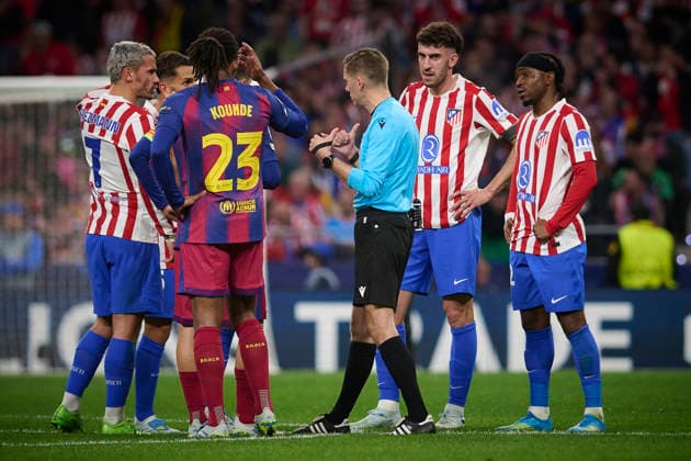 Atletico de Madrid s and FC Barcelona, Barca Ä™s players and referee Clement Turpin during Champions League 2025 2026, quarter-final, 2nd leg, April 14 ,2026. (20260414068)