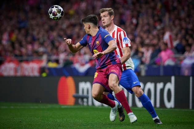 Atletico de Madrid s Alexander Sorloth (r) and FC Barcelona, Barca Ä™s Gerard Martin during Champions League 2025 2026, quarter-final, 2nd leg, April 14 ,2026. (20260414112)