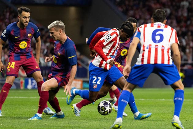 April 14, 2026, Barcelona, Barcelona, Spain: Dani Olmo (L) of FC Barcelona, Barca challenges for the ball with Ademola Lookman (R) of Atletico de Madrid during the UEFA Champions League Quarter Final second leg match between Atletico de Madrid and FC Barcelona at Riyadh Air Metropolitano on April 14, 2026 in Madrid, Spain. Atletico De Madrid Vs FC Barcelona - UEFA Champions League Quarter Final  - ZUMAs316 20260414_znp_s316_035 Copyright: xMartixSeguraxRamonedax