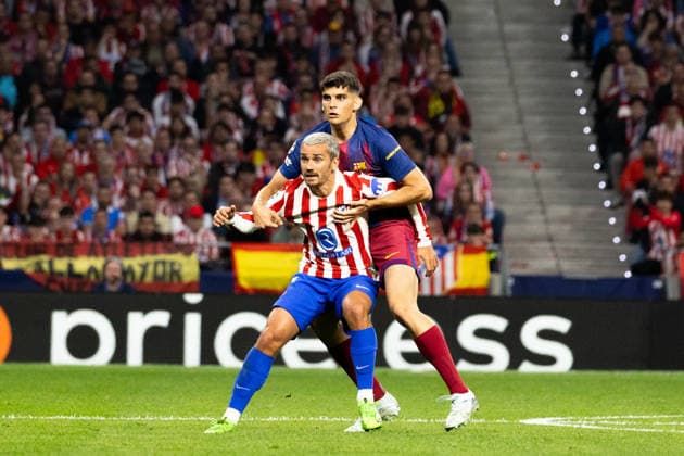 April 14, 2026, Barcelona, Barcelona, Spain: Antoine Griezmann (L) of Atletico de Madrid challenges for the ball with Gerard Martin (R) of FC Barcelona, Barca during the UEFA Champions League Quarter Final second leg match between Atletico de Madrid and FC Barcelona at Riyadh Air Metropolitano on April 14, 2026 in Madrid, Spain. Atletico De Madrid Vs FC Barcelona - UEFA Champions League Quarter Final  - ZUMAs316 20260414_znp_s316_027 Copyright: xMartixSeguraxRamonedax