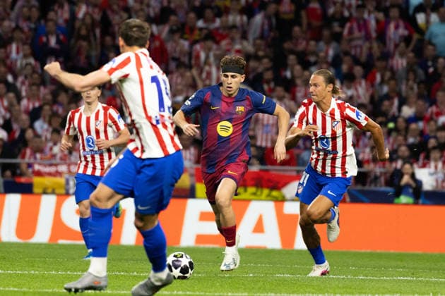 April 14, 2026, Barcelona, Barcelona, Spain: Fermin Lopez (L) of FC Barcelona, Barca challenges for the ball with Marcos Llorente (R) of Atletico de Madrid during the UEFA Champions League Quarter Final second leg match between Atletico de Madrid and FC Barcelona at Riyadh Air Metropolitano on April 14, 2026 in Madrid, Spain. Atletico De Madrid Vs FC Barcelona - UEFA Champions League Quarter Final  - ZUMAs316 20260414_znp_s316_018 Copyright: xMartixSeguraxRamonedax
