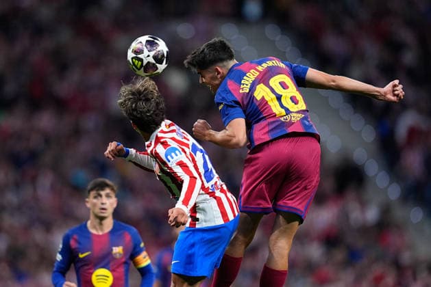 April 14, 2026, Madrid, Madrid, Spain: Gerard Martin of FC Barcelona, Barca and Giuliano Simeone of Atletico de Madrid compete for the ball during the UEFA Champions League 2025 26 Quarter-Final Second Leg match between Atletico de Madrid and FC Barcelona at Riyadh Air Metropolitano on April 14, 2026, in Madrid, Spain. Atletico De Madrid V FC Barcelona - UEFA Champions League 2025 26 Quarter-Final Second Leg  - ZUMAa181 20260414_zaa_a181_344 Copyright: xDennisxAgyemanx