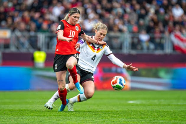 Eileen Campbell 10 Austria and Rebecca Knaak 4 Germany in a duel for the ball during the international match between Germany Austria on 14 04 2026 in Nuremberg Nuremberg Max Morlock Stadium Bayern Germany