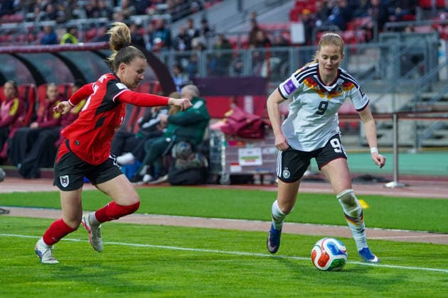 Annabel Schasching 16 Austria and Sjoeke Nüsken 9 Germany in action during the international match between Germany Austria on 14 04 2026 in Nuremberg Nuremberg Max Morlock Stadion Bayern Germany