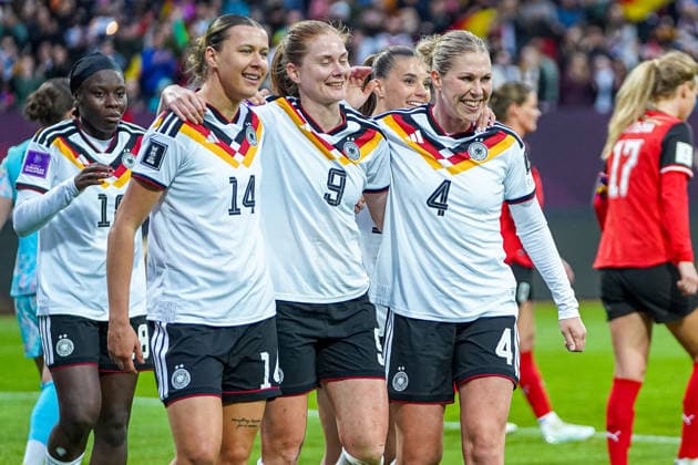 Larissa Mühlhaus 14 Germany , Sjoeke Nüsken 9 Germany and Rebecca Knaak 4 Germany celebrate the goal for 3 1 during the international match between Germany Austria on 14 04 2026 in Nuremberg Nuremberg Max Morlock Stadium Bayern Germany