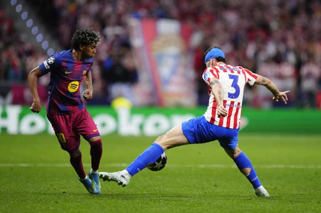 Atletico Madrid v FC Barcelona, Barca - UEFA Champions League MADRID, SPAIN - APRIL 14: Lamine Yamal right winger of Barcelona and Spain and Matteo Ruggeri left-back of Atletico de Madrid and Italy compete for the ball during the UEFA Champions League 2025 26 Quarter-Final Second Leg match between Club Atlético de Madrid and FC Barcelona at Estadio Riyadh Air Metropolitano on April 14, 2026 in Madrid, Spain. Jose Hernandez Anadolu Madrid Spain. Editorial use only. Please get in touch for any other usage.  Copyright: x2026xAnadoluxJosexHernandezx