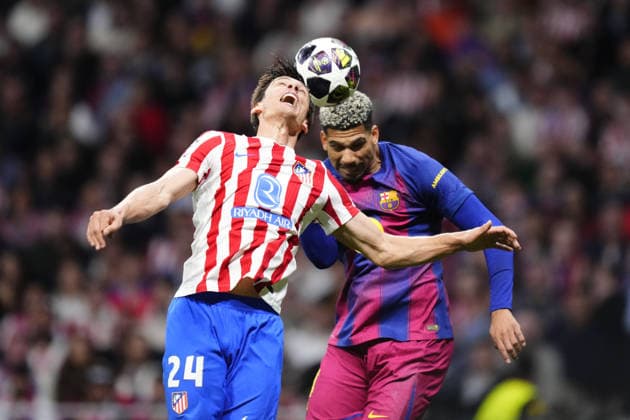 Atletico Madrid v FC Barcelona, Barca - UEFA Champions League MADRID, SPAIN - APRIL 14: Ronald Araujo centre-back of Barcelona and Uruguay and Robin Le Normand centre-back of Atletico Madrid and Spain compete for the ball during the UEFA Champions League 2025 26 Quarter-Final Second Leg match between Atletico Madrid and FC Barcelona at Estadio Riyadh Air Metropolitano on April 14, 2026 in Madrid, Spain. Jose Hernandez Anadolu Madrid Spain. Editorial use only. Please get in touch for any other usage.  Copyright: x2026xAnadoluxJosexHernandezx