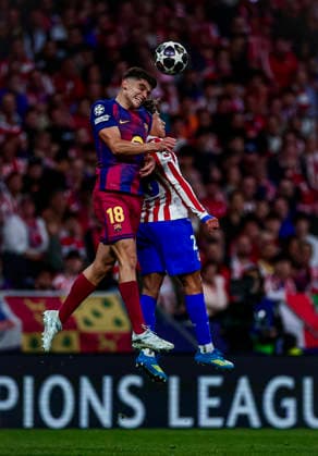Atletico de Madrid CF vs FC Barcelona, Barca - UEFA Champions League - 14 04 2026 Gerard Martin of FC Barcelona battles for the ball with Giuliano Simeone of Atletico de Madrid (R) during the quarter-final second leg UEFA Champions League match between Atletico de Madrid and FC Barcelona at Riyadh Air Metropolitano Stadium on April 14, 2026 in Madrid, Spain. Madrid Spain Copyright: xPabloxGarcia PGSxPhotoxAgencyx
