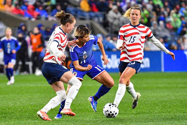 April 14, 2026: United States Women s national team, Nationalteam Midfielder Claire Hutton (15) and Japan Women s National Team Forward Mina Tanaka (11) battle for the ball during the US Womens National Team friendly match vs Japan. Japan defeated the US 1-0. CSM US Womens Soccer 2026: APR 14 Japan At USA  - ZUMAc04_ 20260414_zma_c04_136 Copyright: xStevexFaberx