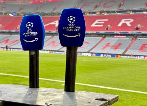 15 04 2026, Football UEFA Championsleague 2025 2026 quarterfinal second leg, FC Bayern Munich Real Madrid, in the Allianz Arena Munich, Two microphones with Champions League logo DFL and DFB regulations prohibit any use of photographs as image sequences and or quasi video