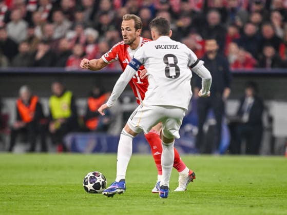 Harry Kane FC Bayern Munich and Federico Valverde Real Madrid battle for the ball during the UEFA Champions League 2025 26 Quarter Final Second Leg match between FC Bayern Munich and Real Madrid CF at Football Arena Munich on April 15, 2026 in Munich, Germany Photo by Harry Langer DeFodi Images