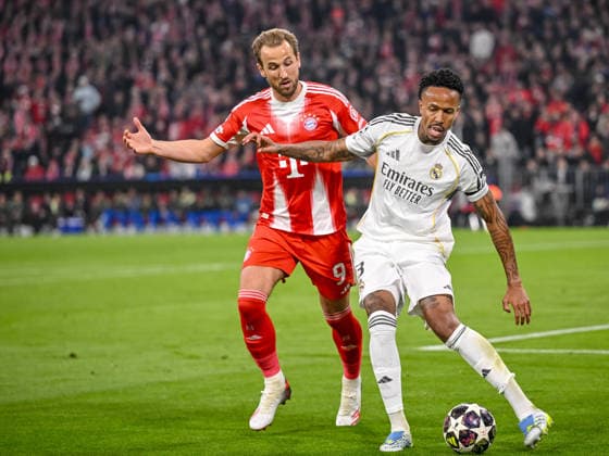 Harry Kane FC Bayern Munich and Eder Militae Real Madrid battle for the ball during the UEFA Champions League 2025 26 Quarter Final Second Leg match between FC Bayern Munich and Real Madrid CF at Football Arena Munich on April 15, 2026 in Munich, Germany Photo by Harry Langer DeFodi Images