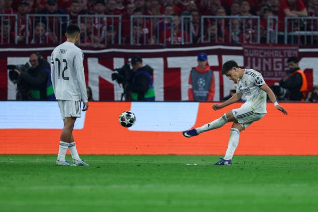 GER, CL Quarterfinal FC Bayern Muenchen GER vs Real Madrid ESP 15 04 2026, Allianz Arena, Munich, GER, CL Quarterfinal FC Bayern Muenchen GER vs Real Madrid ESP , in the picture picture shows Arda Güler Arda Gueler Real Madrid 15 at the goal shot at the goal of FC Bayern München FC Bayern Muenchen to 1 2 nordphotoxGmbHx xSchneider nph00003