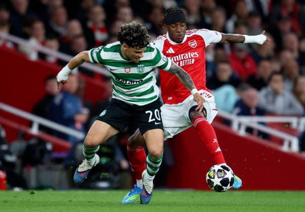 Arsenal FC v Sporting Clube de Portugal - UEFA Champions League 2025 26 Quarter-Final Second Leg Maximiliano Araujo of Sporting Clube de Portugal amd Noni Madueke of Arsenal challenge during the UEFA Champions League 2025 26 Quarter-Final Second Leg match between Arsenal FC and Sporting Clube de Portugal at Arsenal Stadium on April 15, 2026 in London, England. WARNING! This Photograph May Only Be Used For Newspaper And Or Magazine Editorial Purposes. May Not Be Used For Publications Involving 1 player, 1 Club Or 1 Competition Without Written Authorisation From Football DataCo Ltd. For Any Queries, Please Contact Football DataCo Ltd on +44 (0) 207 864 9121 London Arsenal Stadium England United Kingdom Copyright: xAllstarxPicturexLibraryxLtdx