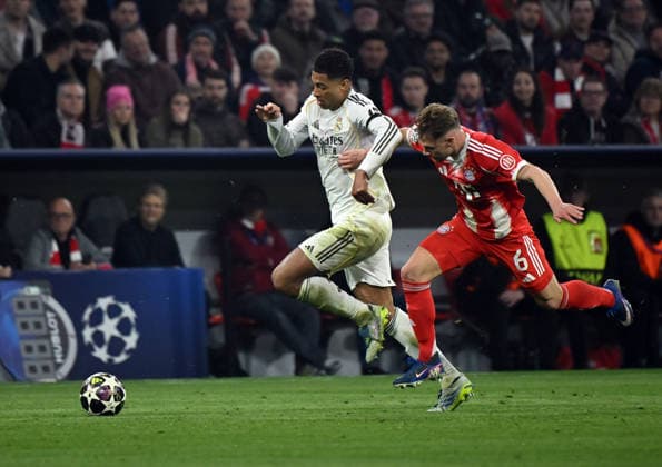 15 04 2026, xemx, Football UEFA Champions League, FC Bayern Muenchen Real Madrid v l Jude Bellingham Real Madrid , Joshua Kimmich FC Bayern Muenchen DFL DFB REGULATIONS PROHIBIT ANY USE OF PHOTOGRAPHS as IMAGE SEQUENCES and or QUASI VIDEO Muenchen