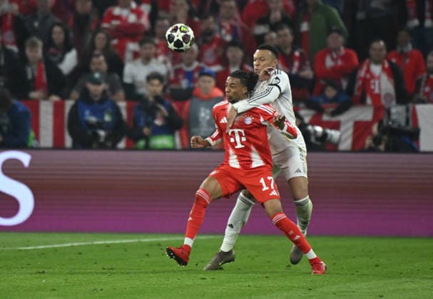 15 04 2026, xemx, Football UEFA Champions League, FC Bayern Muenchen Real Madrid v l Michael Olise FC Bayern Muenchen , Kylian Mbappe Real Madrid DFL DFB REGULATIONS PROHIBIT ANY USE OF PHOTOGRAPHS as IMAGE SEQUENCES and or QUASI VIDEO Muenchen