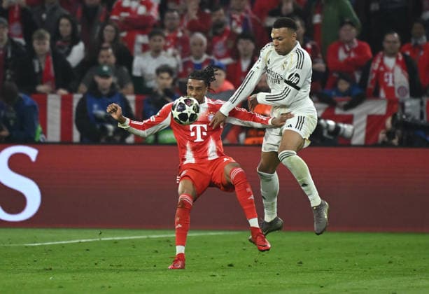 15 04 2026, xemx, Football UEFA Champions League, FC Bayern Muenchen Real Madrid v l Michael Olise FC Bayern Muenchen , Kylian Mbappe Real Madrid DFL DFB REGULATIONS PROHIBIT ANY USE OF PHOTOGRAPHS as IMAGE SEQUENCES and or QUASI VIDEO Muenchen