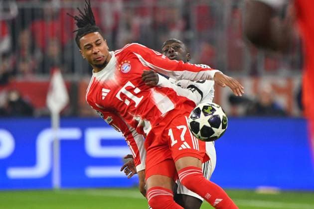 Michael OLISE Bayern Muenchen , action,duel against Ferland MENDI Real Madrid after goal to 2 3,jubilation,joy,enthusiasm, action soccer Champions League,season 2025 26, quarterfinal FC Bayern Muenchen Real Madrid on 15 04 2026 A L L I A N Z A R E N A