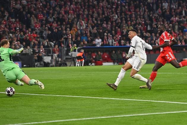 Goal Kylian MBAPPE Real Madrid to 2 3, Action,Goal kick against Manuel NEW Goalkeeper Bayern Muenchen ,re Dayot UPAMECANO Bayern Muenchen penalty area scene after goal to 2 3,Cheering,Joy,Enthusiasm, Action Football Champions League,Season 2025 26, Quarterfinal FC Bayern Muenchen Real Madrid on 15 04 2026 A L L I A N Z A R E N A