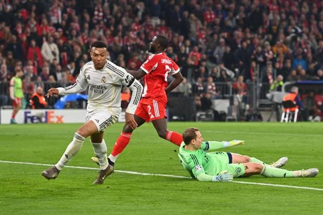 Goal Kylian MBAPPE Real Madrid to 2 3, Action,Goal kick against Manuel NEW Goalkeeper Bayern Muenchen ,re Dayot UPAMECANO Bayern Muenchen penalty area scene after goal to 2 3,Cheering,Joy,Enthusiasm, Action Football Champions League,Season 2025 26, Quarterfinal FC Bayern Muenchen Real Madrid on 15 04 2026 A L L I A N Z A R E N A