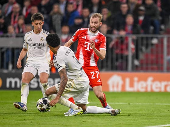 Arda Güler Real Madrid , Eder Militae Real Madrid and Konrad Laimer FC Bayern München battle for the ball during the UEFA Champions League 2025 26 Quarter Final Second Leg match between FC Bayern München and Real Madrid CF at Football Arena Munich on April 15, 2026 in Munich, Germany Photo by Harry Langer DeFodi Images