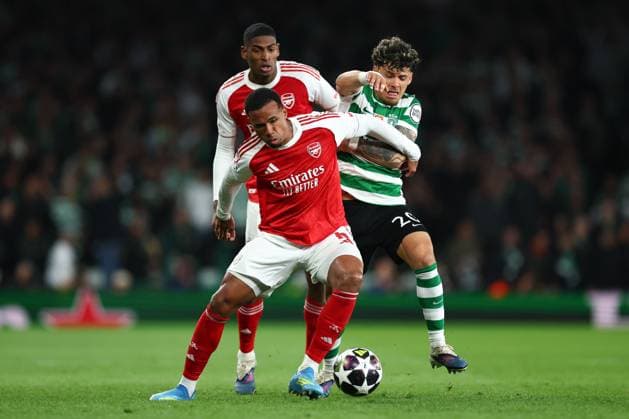 Gabriel of Arsenal under pressure from Maximiliano Araujo of Sporting CP Arsenal v Sporting, UEFA Champions League, Quarter Final, Second Leg, Football, Emirates Stadium, London, UK - 15 Apr 2026London Emirates Stadium United Kingdom EDITORIAL USE ONLY No use with unauthorised audio, video, data, fixture lists, club league logos or live services. Online in-match use limited to 120 images, no video emulation. No use in betting, games or single club league player publications.  Copyright: xSimonxDael Shutterstockx 16828544bb