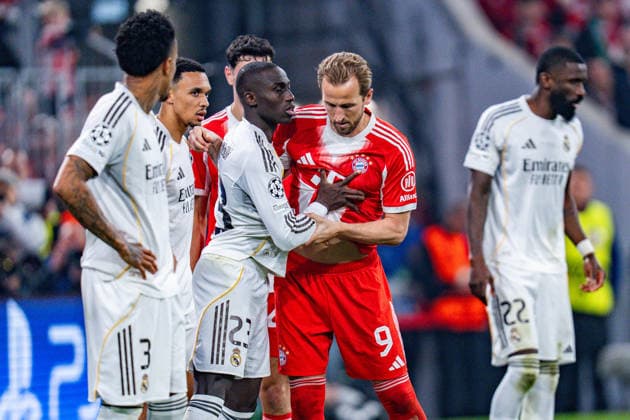 15 04 2026, FC Bayern München vs Real Madrid, UEFA Champions League, quarter-final second leg Harry Kane FC Bayern Muenchen, 9 Ferland Mendy Real Madrid, 23 Regulations prohibit any use of photographs as image sequences and or quasi video Copyright: xBahhoxKarax