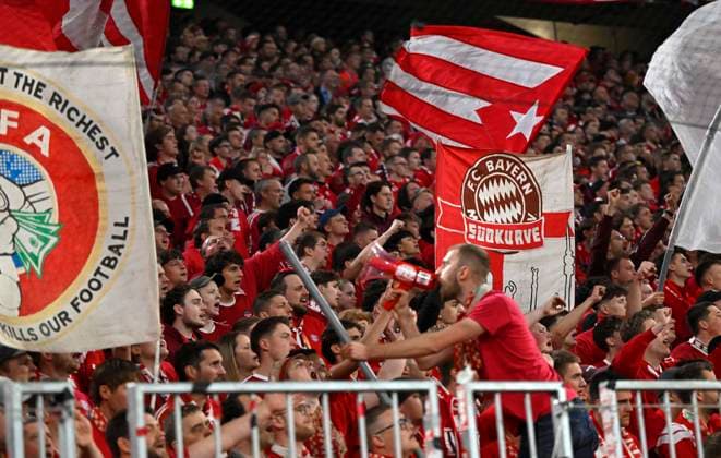 15 04 2026, Football UEFA Championsleague 2025 2026 quarter-final second leg, FC Bayern Munich Real Madrid, in the Allianz Arena Munich, The South Curve in red DFL and DFB regulations prohibit any use of photographs as image sequences and or quasi video