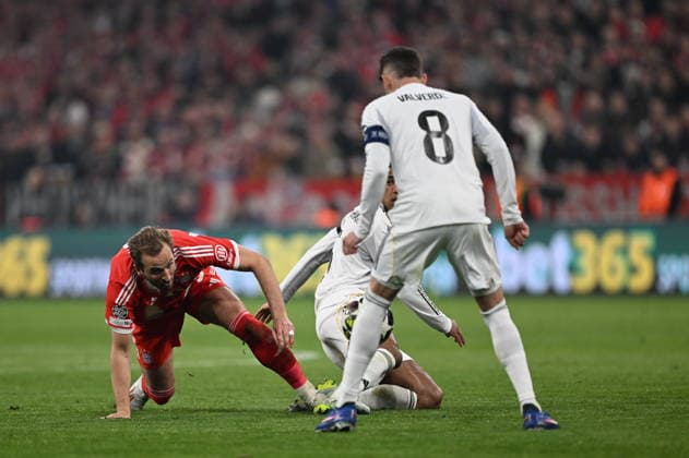 Bayern Munich v Real Madrid - UEFA Champions League Quarter-final MUNICH, GERMANY - APRIL 15: Jude Bellingham and Valverde of Real Madrid in action against Harry Kane of Bayern Munich during the UEFA Champions League 2025 26 Quarter-Final Second Leg match between FC Bayern Munich and Real Madrid CF at Football Arena Munich on April 15, 2026 in Munich, Germany. Halil Sagirkaya Anadolu Munich Germany. Editorial use only. Please get in touch for any other usage.  Copyright: x2026xAnadoluxHalilxSagirkayax