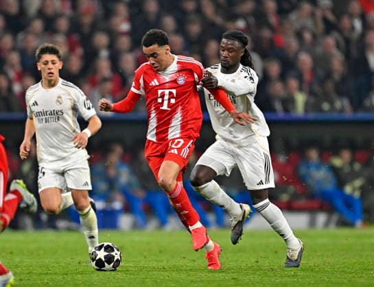 15 04 2026, Football UEFA Championsleague 2025 2026 quarter-final second leg, FC Bayern Munich Real Madrid, in the Allianz Arena Munich, f l Arda Güler Real Madrid , Jamal Musiala Bayern Munich and Eduardo Camavinga Real Madrid DFL and DFB regulations prohibit any use of photographs as image sequences and or quasi video