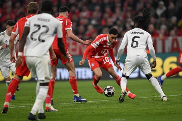 Bayern Munich v Real Madrid - UEFA Champions League Quarter-final MUNICH, GERMANY - APRIL 15: Bayern Munich s Jamal Musiala (R-2) in action against Eduardo Camavinga (R) of Real Madrid during the UEFA Champions League 2025 26 Quarter-Final Second Leg match between FC Bayern Munich and Real Madrid CF at Football Arena Munich on April 15, 2026 in Munich, Germany. Halil Sagirkaya Anadolu Munich Germany. Editorial use only. Please get in touch for any other usage.  Copyright: x2026xAnadoluxHalilxSagirkayax