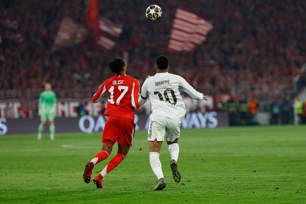 15 04 2026, xjrdrx, Football UEFA Champions League, FC Bayern Muenchen Real Madrid v l Michael Olise FC Bayern Muenchen Kylian Mbappe Real Madrid Zweikampf, Aktion, action, battle for the ball DFL DFB REGULATIONS PROHIBIT ANY USE OF PHOTOGRAPHS as IMAGE SEQUENCES and or QUASI VIDEO Muenchen