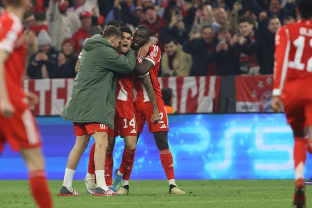 Luis Diaz FC Bayern München celebrates after scoring his team s third goal with teammates during the UEFA Champions League 2025 26 Quarter Final Second Leg match between FC Bayern München and Real Madrid CF at Football Arena Munich on April 15, 2026 in Munich, Germany Photo by Oliver Kaelke DeFodi Images