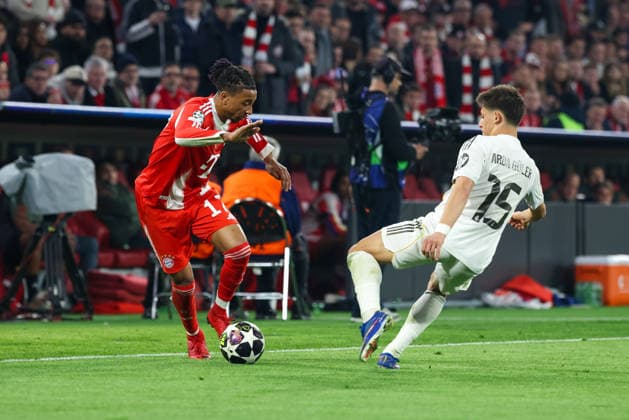 duel Michael Olise FC Bayern Muenchen, 17 with Arda Gueler Real Madrid CF, 15 , GER, FC Bayern Muenchen vs Real Madrid CF, Football, UEFA Champions League, quarter-final, second leg, 2025 2026 season, 15 04 2026, GER, FC Bayern Muenchen vs Real Madrid CF, Football, UEFA Champions League, quarter-final, second leg, 2025 2026 season, 15 04 2026 Muenchen Copyright: xEibner-Pressefoto JennixMaulx EP_JML