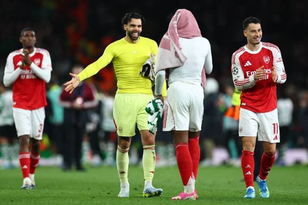 David Raya of Arsenal with Eberechi Eze of Arsenal and Gabriel Martinelli of Arsenal at full time Arsenal v Sporting, UEFA Champions League, Quarter Final, Second Leg, Football, Emirates Stadium, London, UK - 15 Apr 2026London Emirates Stadium United Kingdom EDITORIAL USE ONLY No use with unauthorised audio, video, data, fixture lists, club league logos or live services. Online in-match use limited to 120 images, no video emulation. No use in betting, games or single club league player publications.  Copyright: xSimonxDael Shutterstockx 16828544bs
