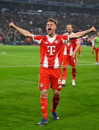 15 04 2026, Football UEFA Championsleague 2025 2026 quarter-final second leg, FC Bayern Munich Real Madrid, in the Allianz Arena Munich, Joshua Kimmich FC Bayern Munich is happy after the match DFL and DFB regulations prohibit any use of photographs as image sequences and or quasi video